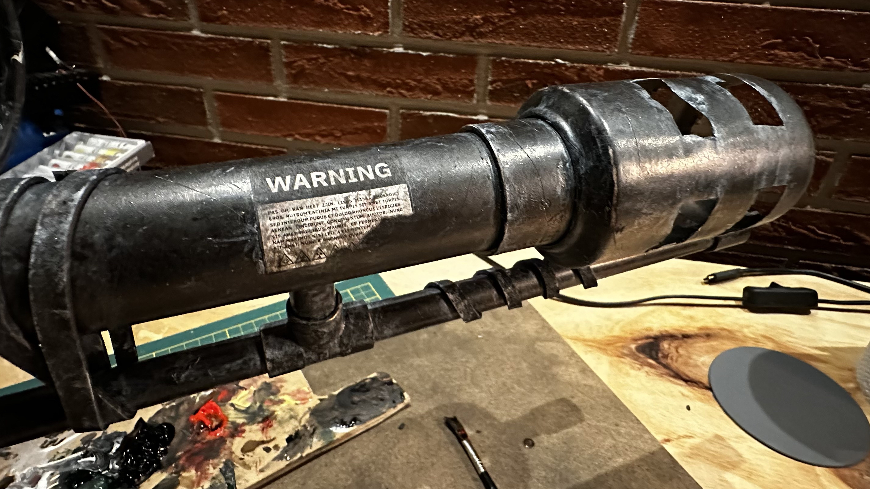 Detailed photo of the front part OF THE MOCK FLAMETHROWER
